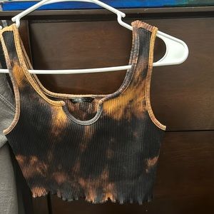 Black bleached crop top with a slit at the breast area.